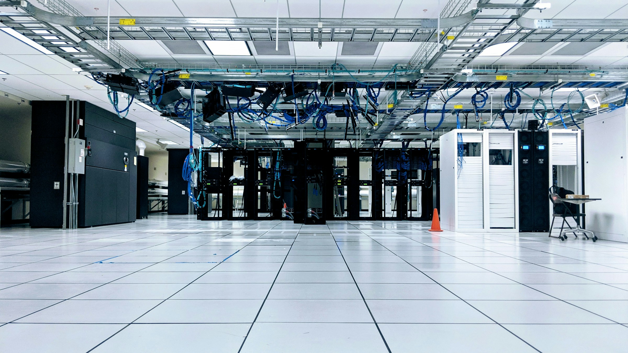 Rows of server cabinets in a data center